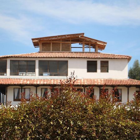 Hotel Tota Eliseo Playa Blanca Lago De トタ エクステリア 写真
