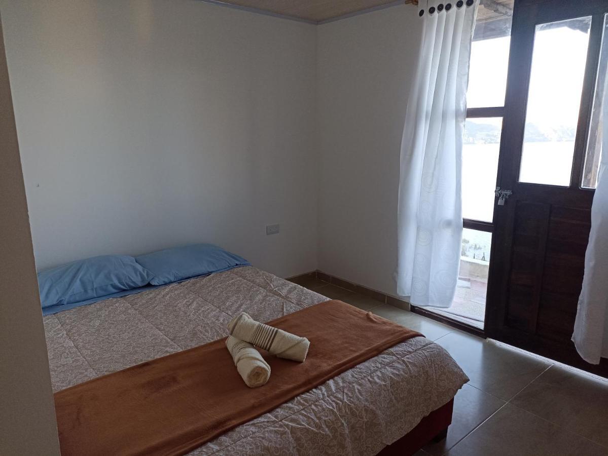 Hotel Tota Eliseo Playa Blanca Lago De トタ エクステリア 写真