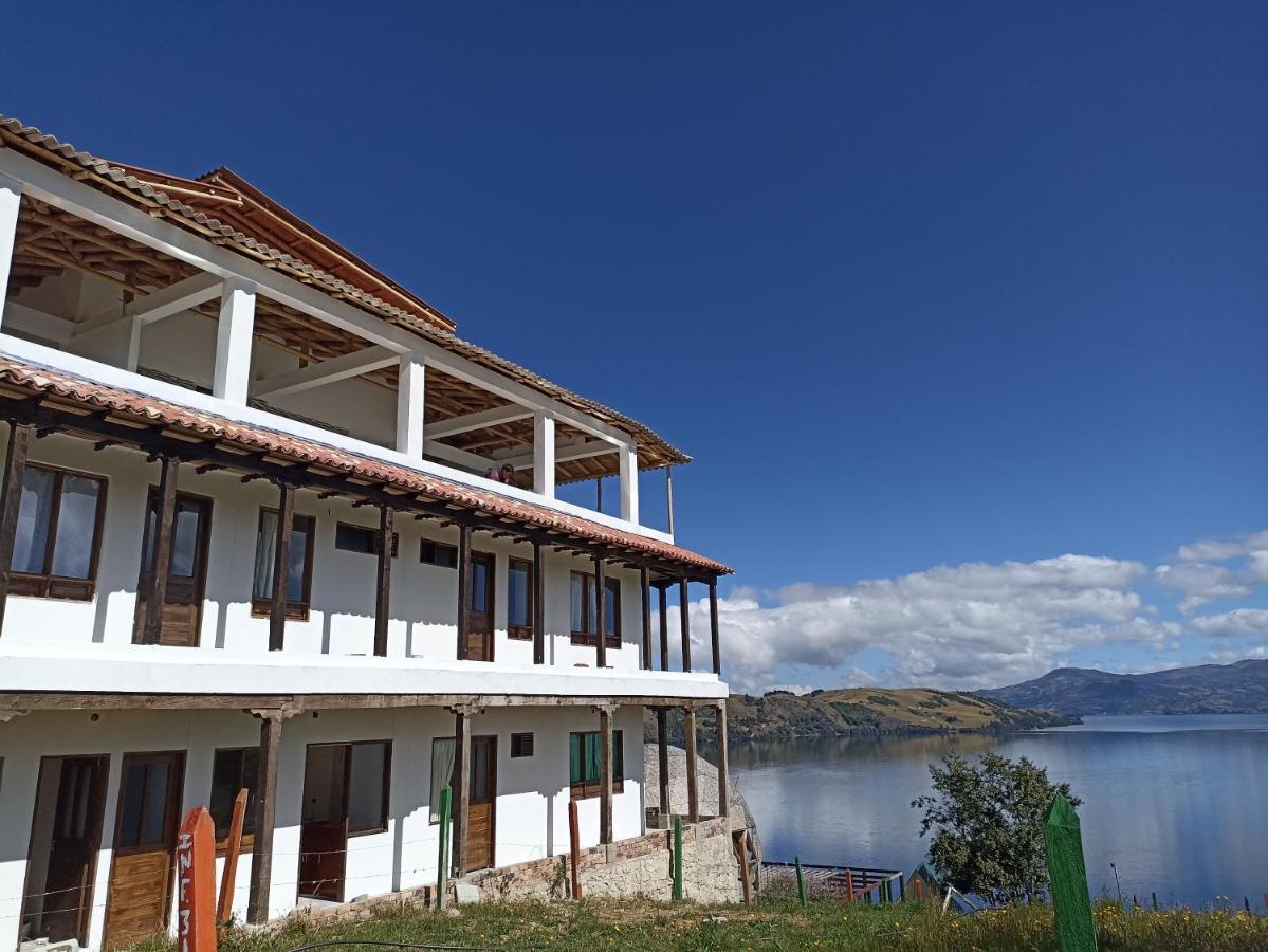 Hotel Tota Eliseo Playa Blanca Lago De トタ エクステリア 写真