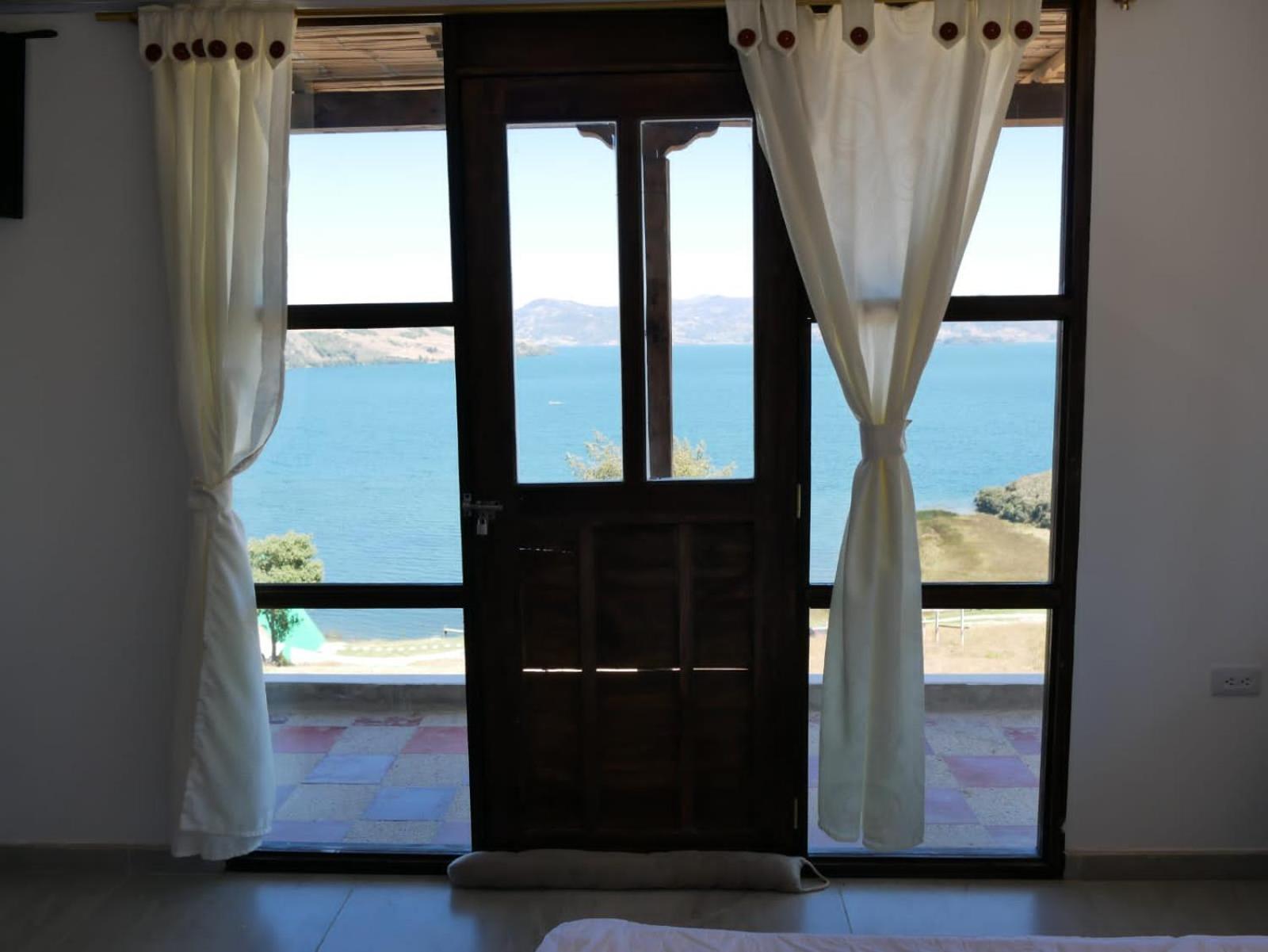 Hotel Tota Eliseo Playa Blanca Lago De トタ エクステリア 写真