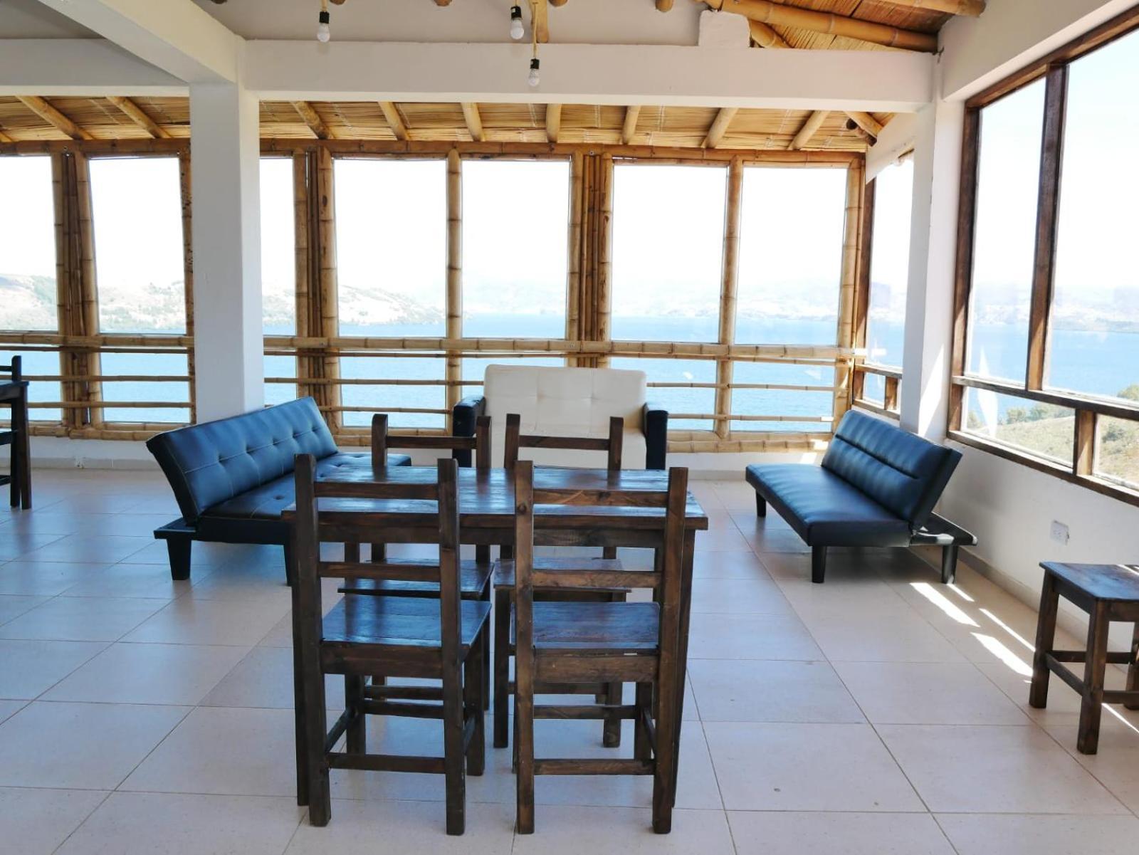 Hotel Tota Eliseo Playa Blanca Lago De トタ エクステリア 写真