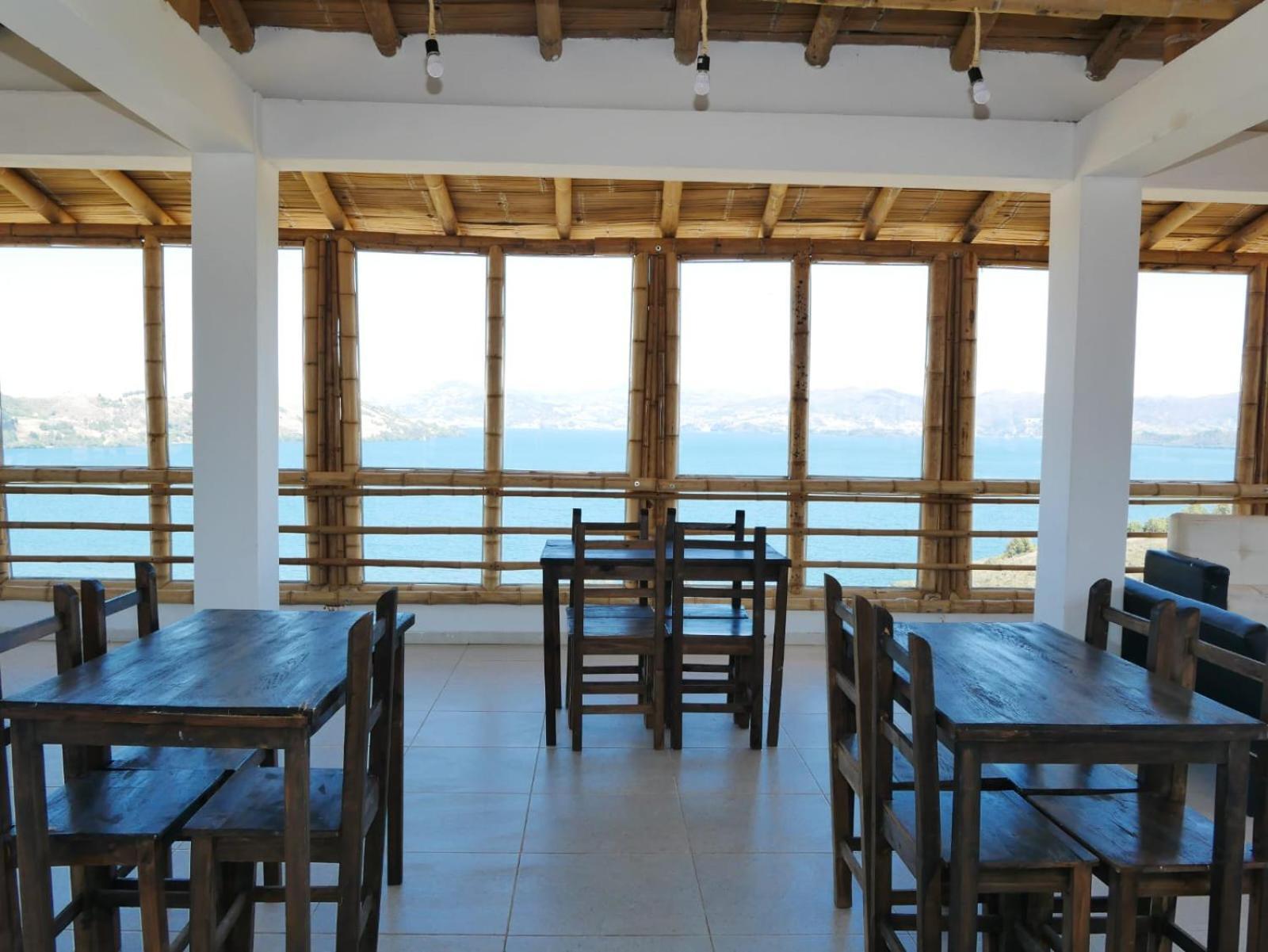 Hotel Tota Eliseo Playa Blanca Lago De トタ エクステリア 写真