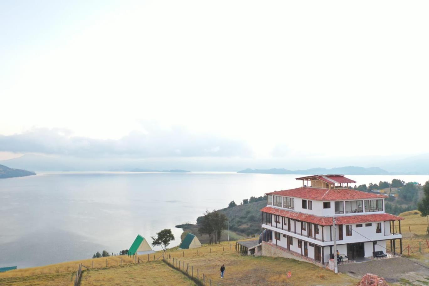 Hotel Tota Eliseo Playa Blanca Lago De トタ エクステリア 写真