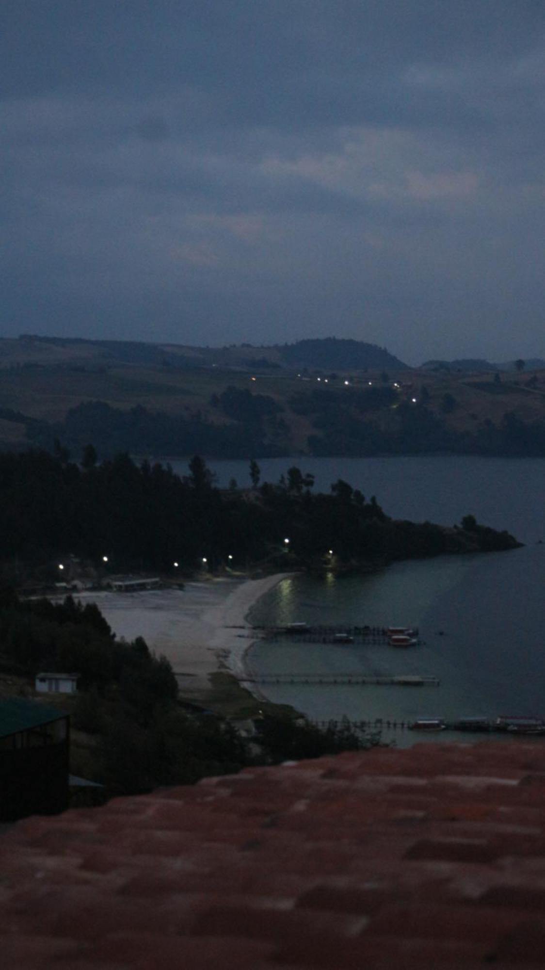Hotel Tota Eliseo Playa Blanca Lago De トタ エクステリア 写真