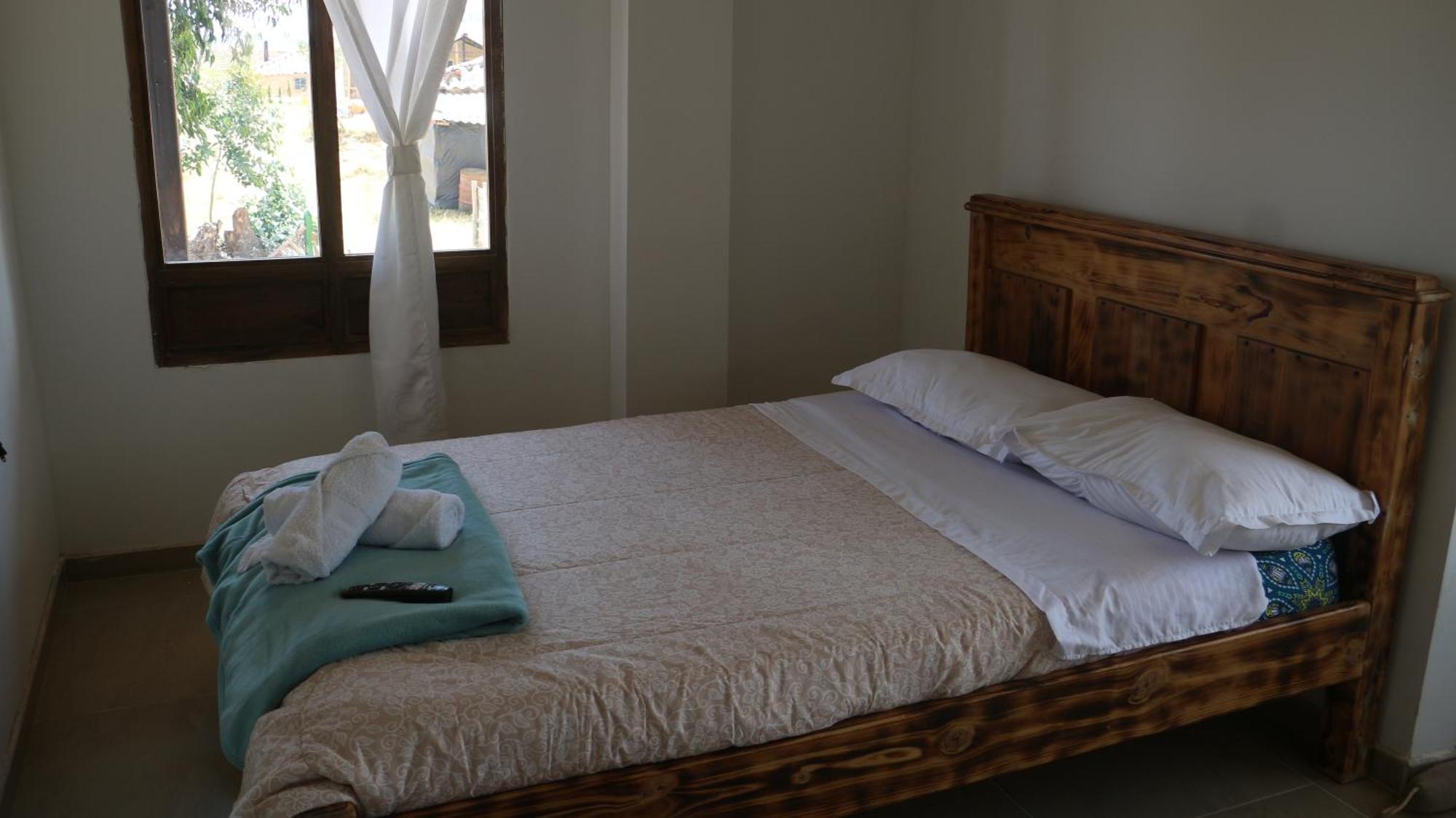 Hotel Tota Eliseo Playa Blanca Lago De トタ エクステリア 写真
