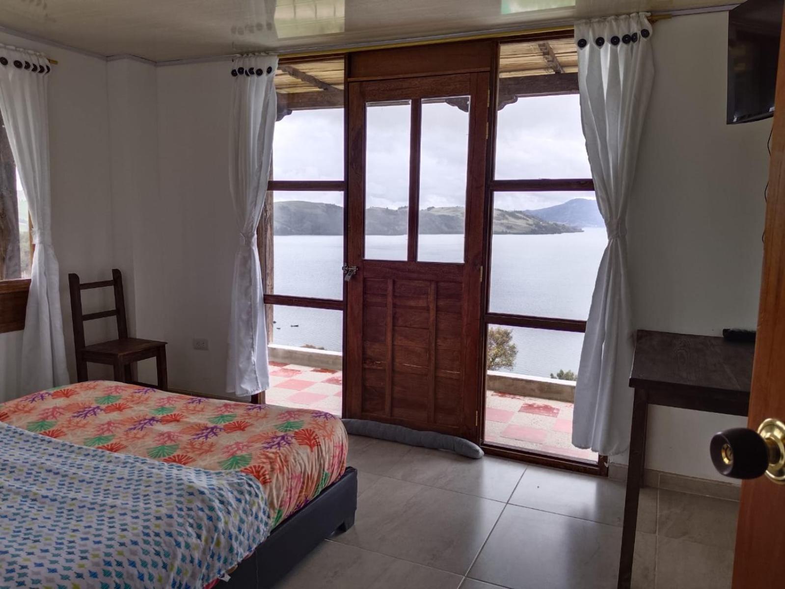 Hotel Tota Eliseo Playa Blanca Lago De トタ エクステリア 写真