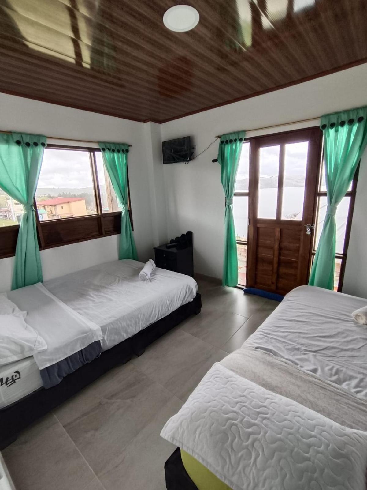 Hotel Tota Eliseo Playa Blanca Lago De トタ エクステリア 写真