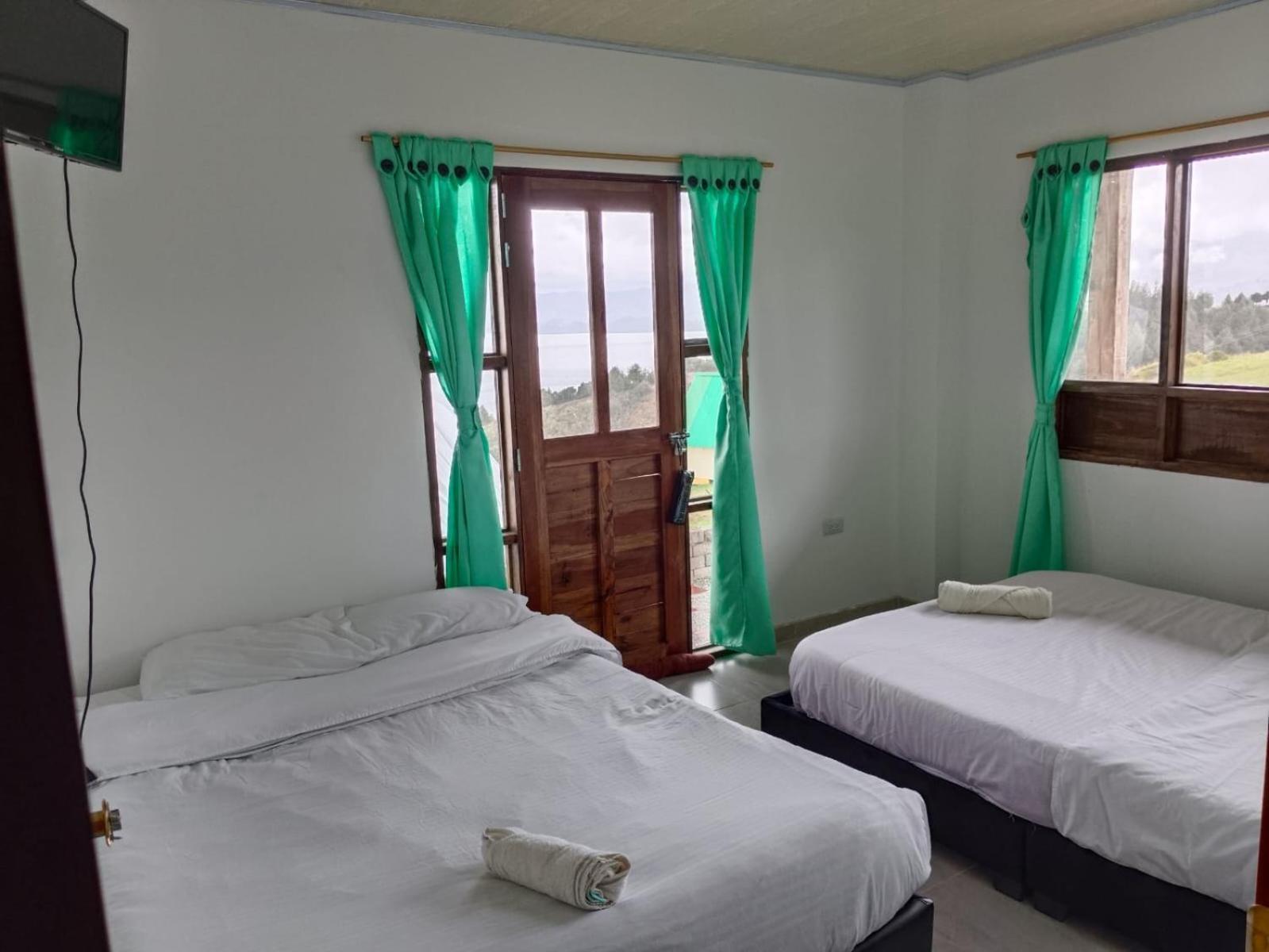 Hotel Tota Eliseo Playa Blanca Lago De トタ エクステリア 写真